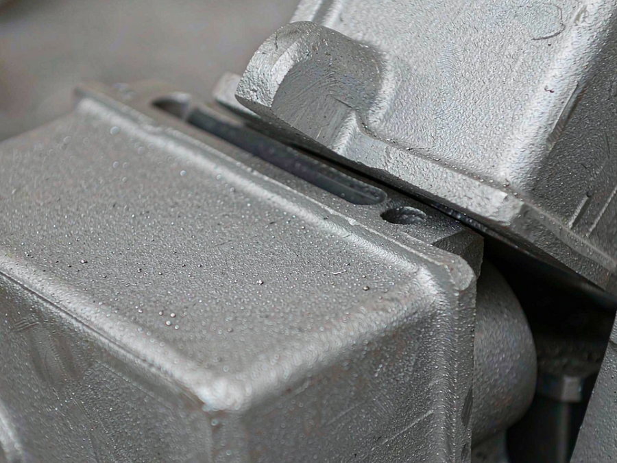 Shot-blasted grey iron castings with a uniform matte silver surface